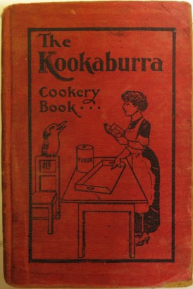 Cover of The Kookaburra cookery book, showing a kookaburra and a woman preparing to cook.