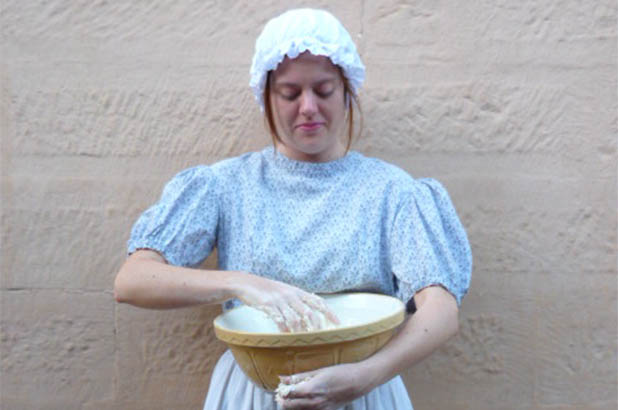'Scullery maid' Anna making bread.