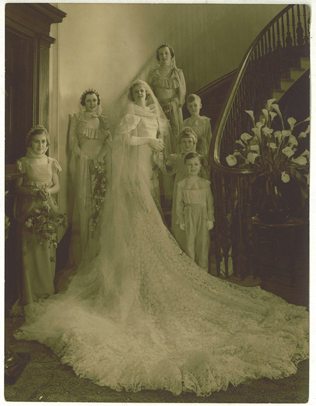 Photograph showing bride, musical comedy star, Madge Elliot, and bridal party on the saloon stair at Elizabeth Bay House