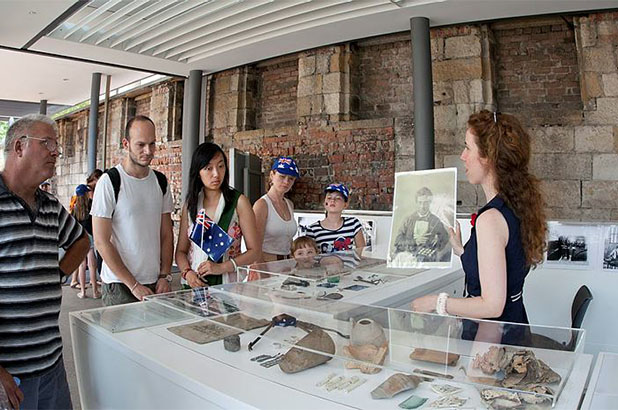 Fiona Starr, with visitors enjoying the displays at the Mint on Australia Day.