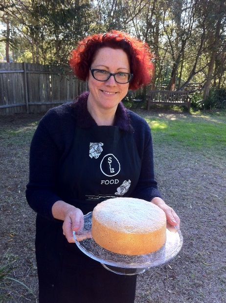 Eat your history recipe testing volunteer Margot Riley with handmade Meroogal sponge cake