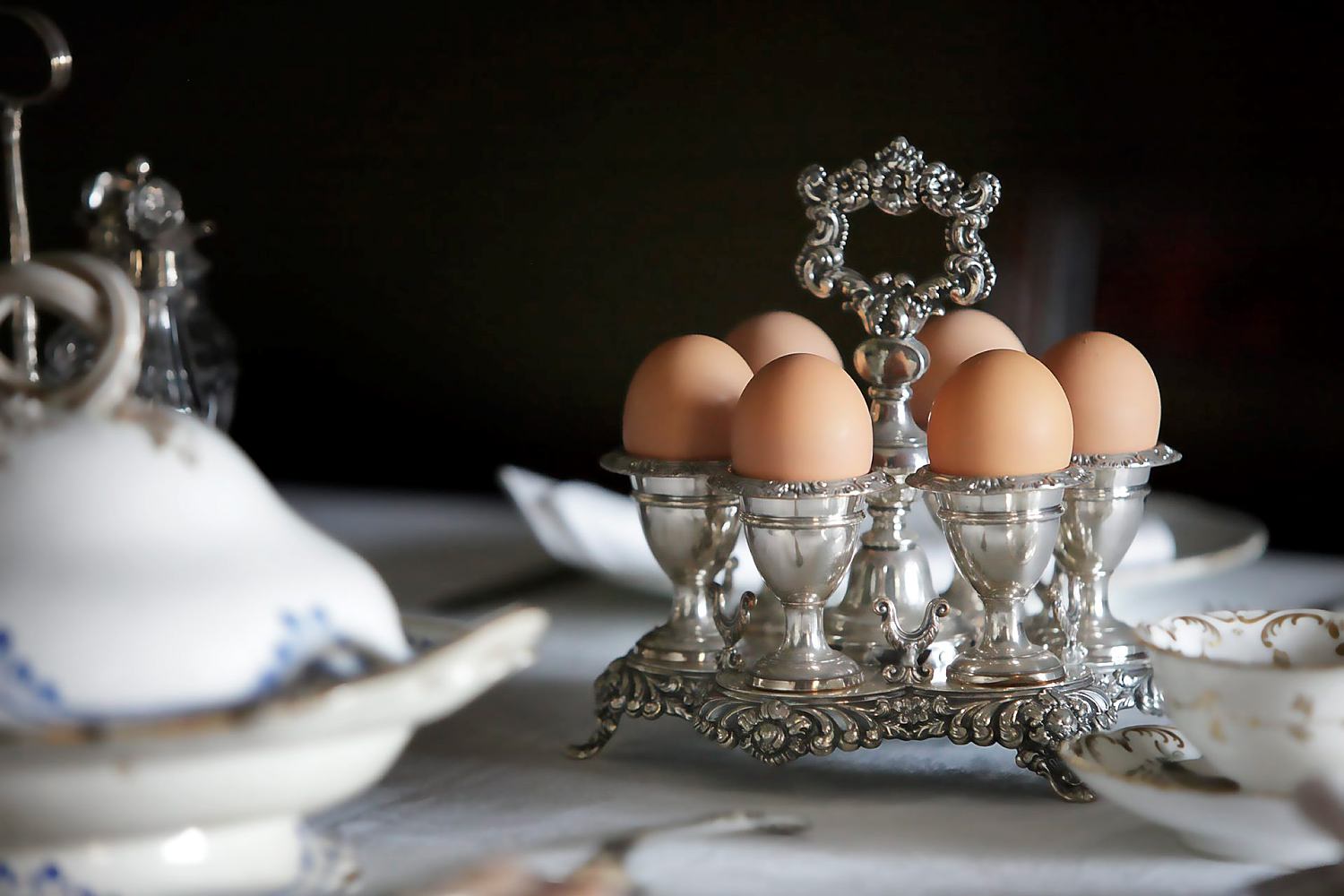 Eggcup trivet as part of a recreated breakfast setting. Photograph (c) Paolo Busato, Historic Houses Trust of NSW
